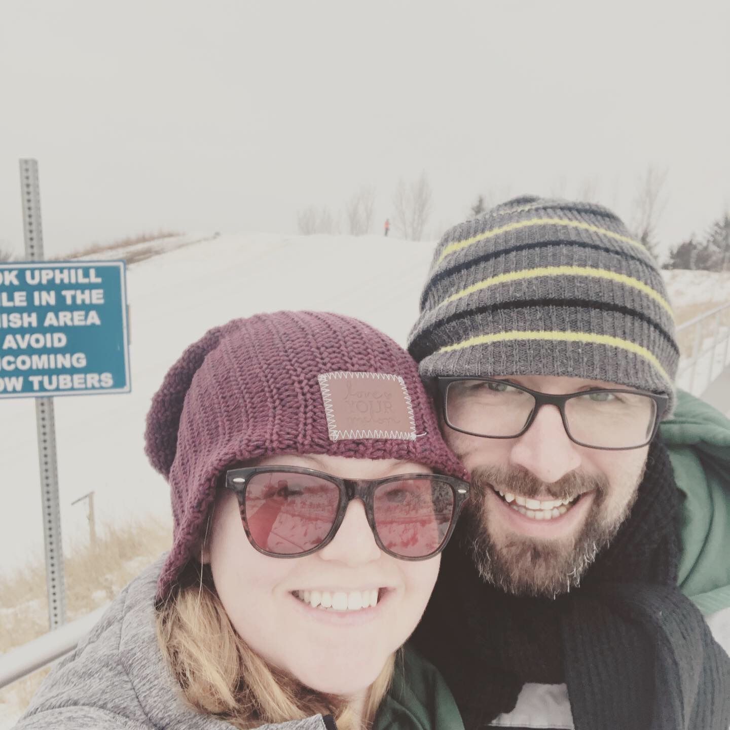 Abby and Chad Wildeboer selfie on a hiking trail