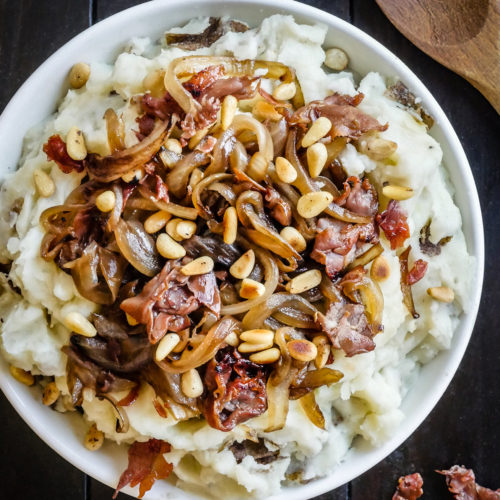 mashed potatoes with crispy prosciutto, onions, and pine nuts