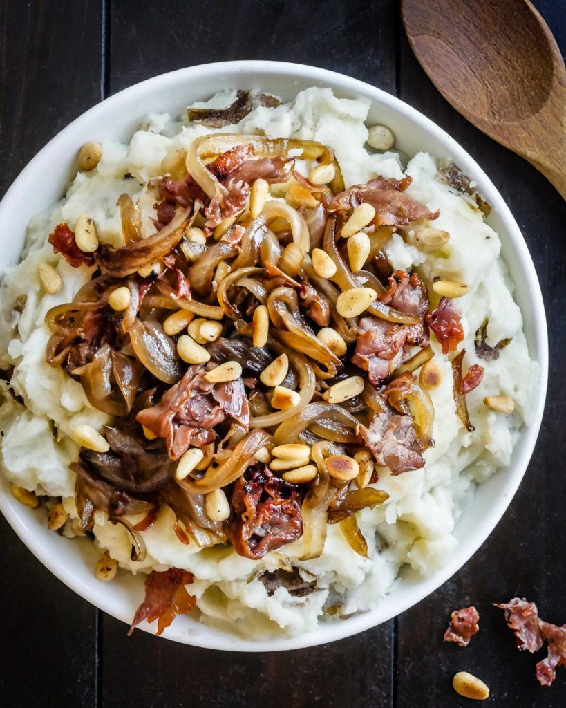 mashed potatoes with crispy prosciutto, onions, and pine nuts