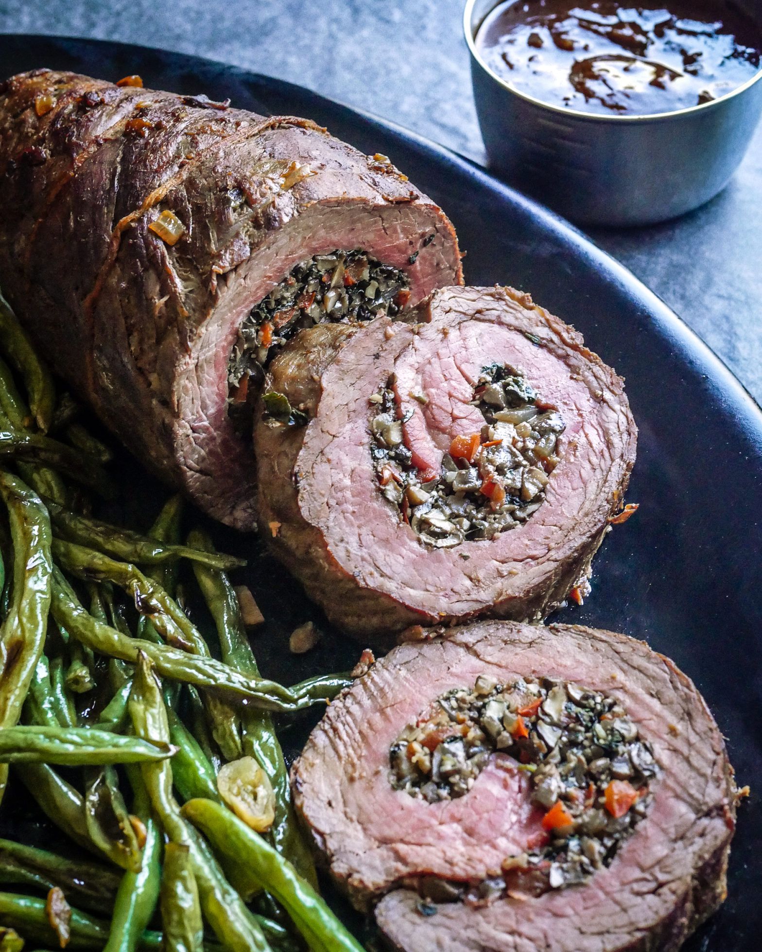 Mushroom-Stuffed Beef Roulade with Garlicky Green Beans