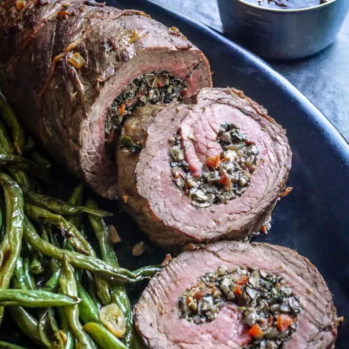 Mushroom stuffed beef roulade with green beans