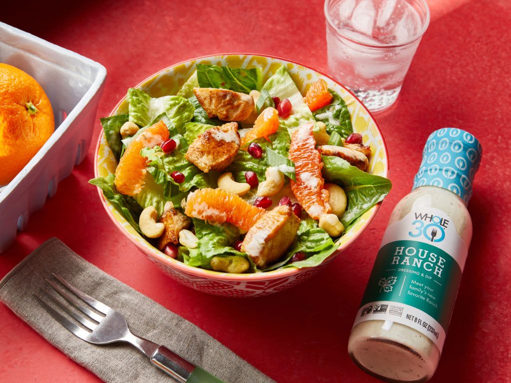 Fruity A bowl of Chicken Chopped Salad next to a bottle of Made by Whole30 House Ranch.