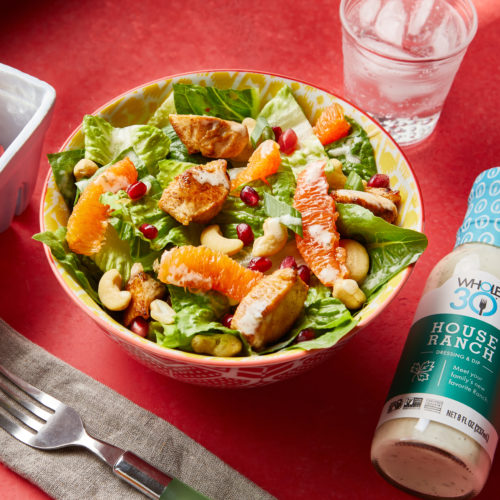 Fruity A bowl of Chicken Chopped Salad next to a bottle of Made by Whole30 House Ranch.