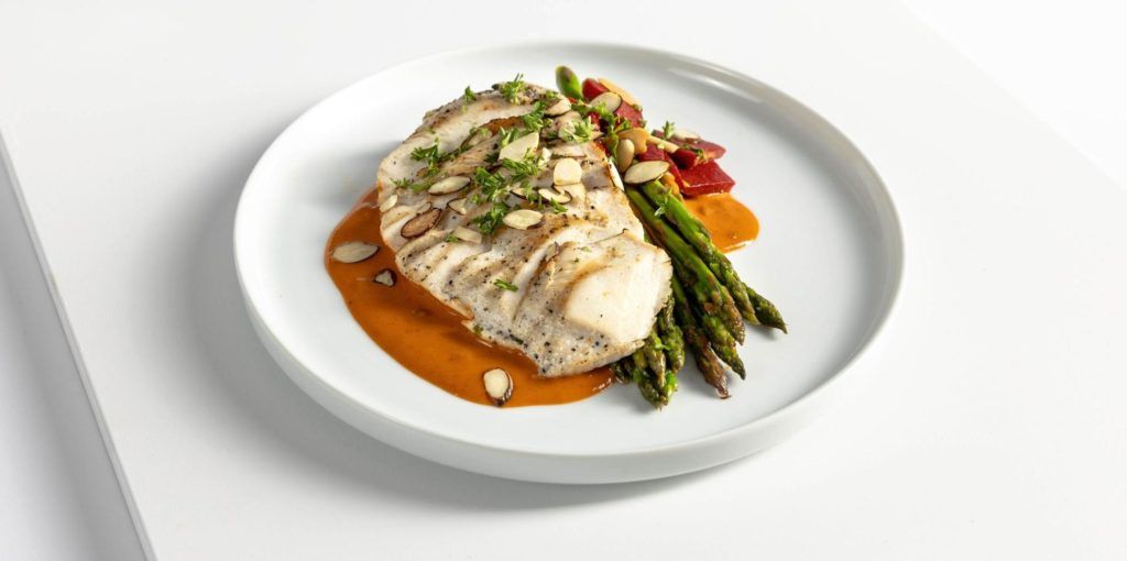 Trifecta Meal Delivery Service. Photo of a cooked chicken breast with asparagus.