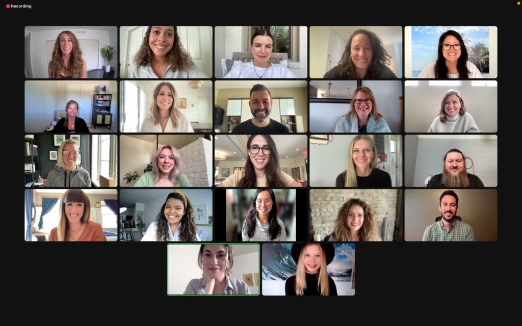 Whole30 Team Photo. Whole30 HQ Members smiling at their cameras.