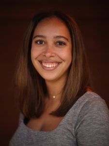 Whole30 Project Manager, Lindsay Rhodes in a gray shirt smiling at the camera.