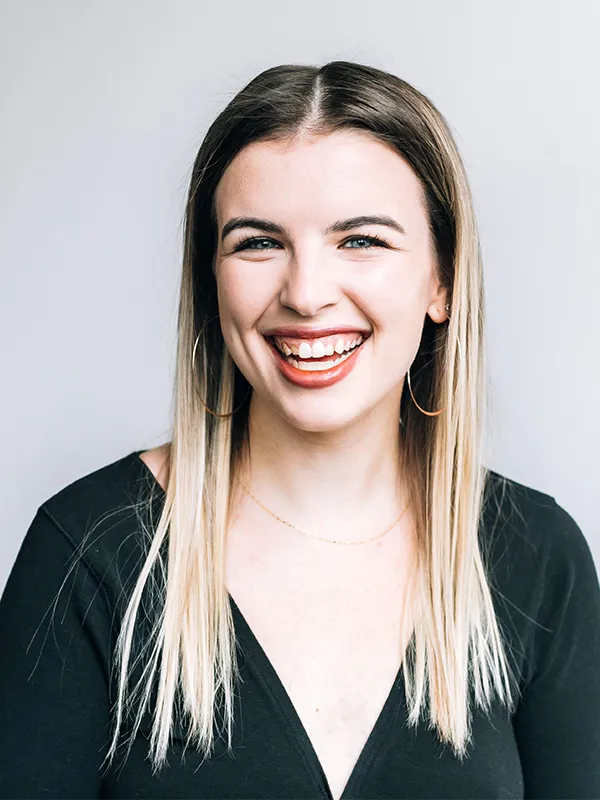 Whole30 Branded Content Coordinator, Paige Carnahan smiling at the camera.