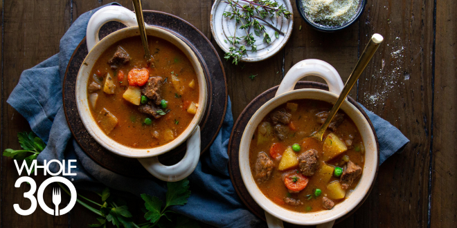 Two bowls of Whole30 Beef Stew with fresh thyme