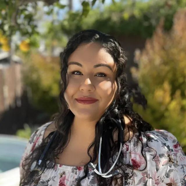 Dr.Carolina Arreola, a Licensed Naturopathic Doctor, smiling at the camera.