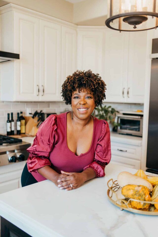 Rosy Godycki in a rep top smiling at the camera.