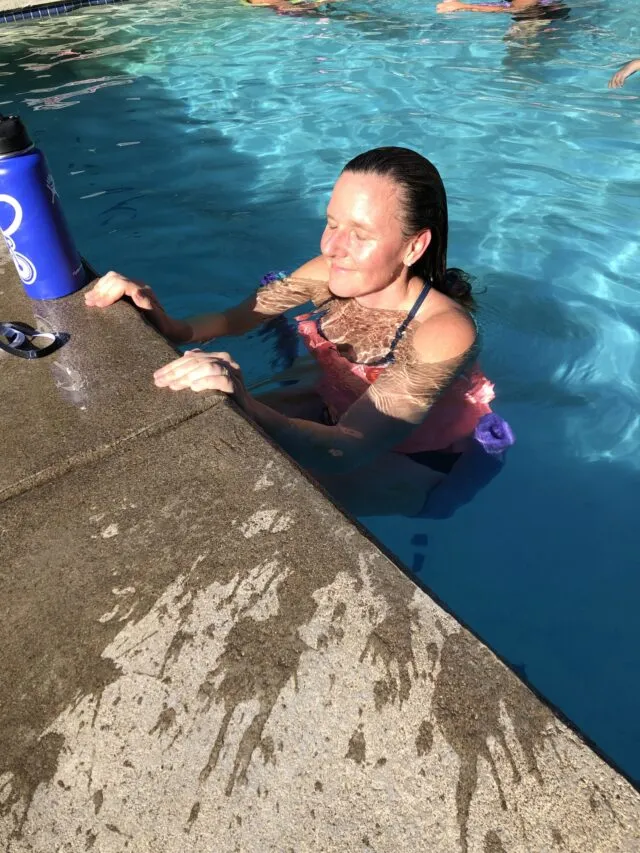 Becky Best swimming in a pool