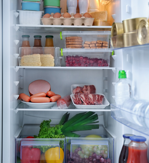 An image of a refrigerator filled with an assortment of food.