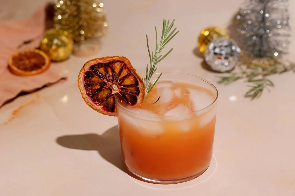 Sparkling Rosemary Citrus Mocktail with dried blood oranges and rosemary garnish