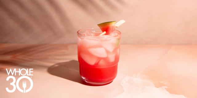 Watermelon Basil Fizz Mocktail on light pink marble background